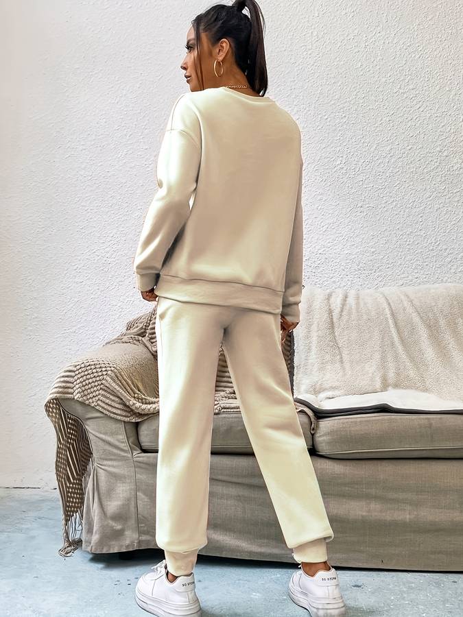Joy - Elegante conjunto de jersey y pantalón para mujer