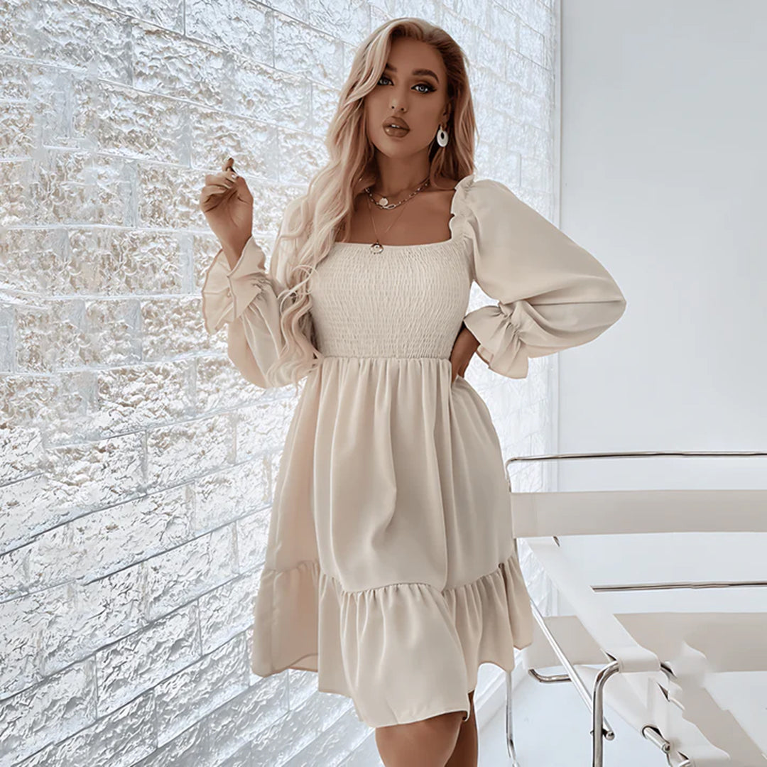 ARIA - Elegante vestido con bonitos volantes