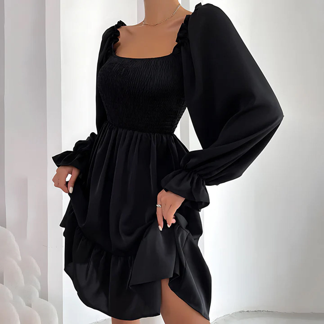 ARIA - Elegante vestido con bonitos volantes