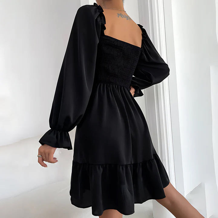 ARIA - Elegante vestido con bonitos volantes