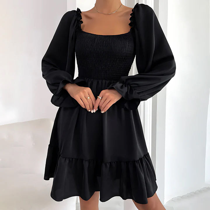 ARIA - Elegante vestido con bonitos volantes