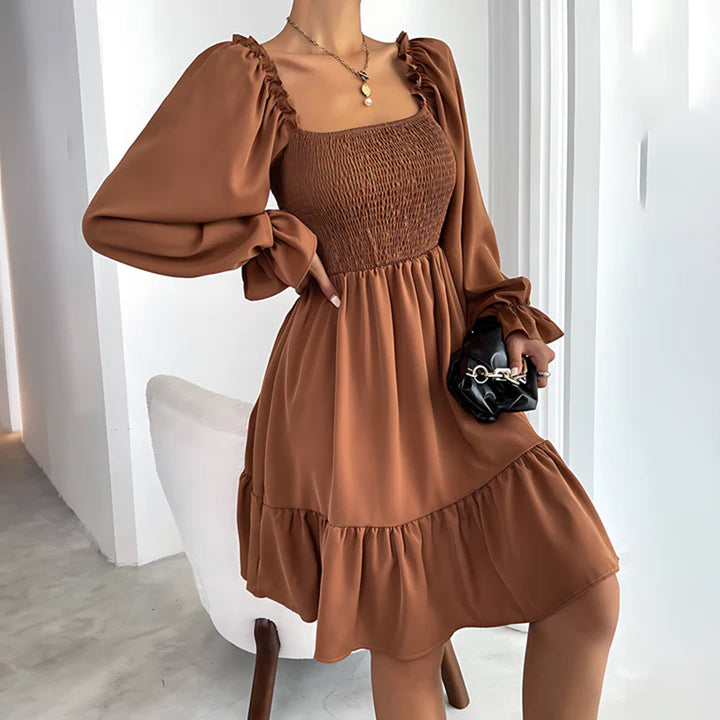 ARIA - Elegante vestido con bonitos volantes