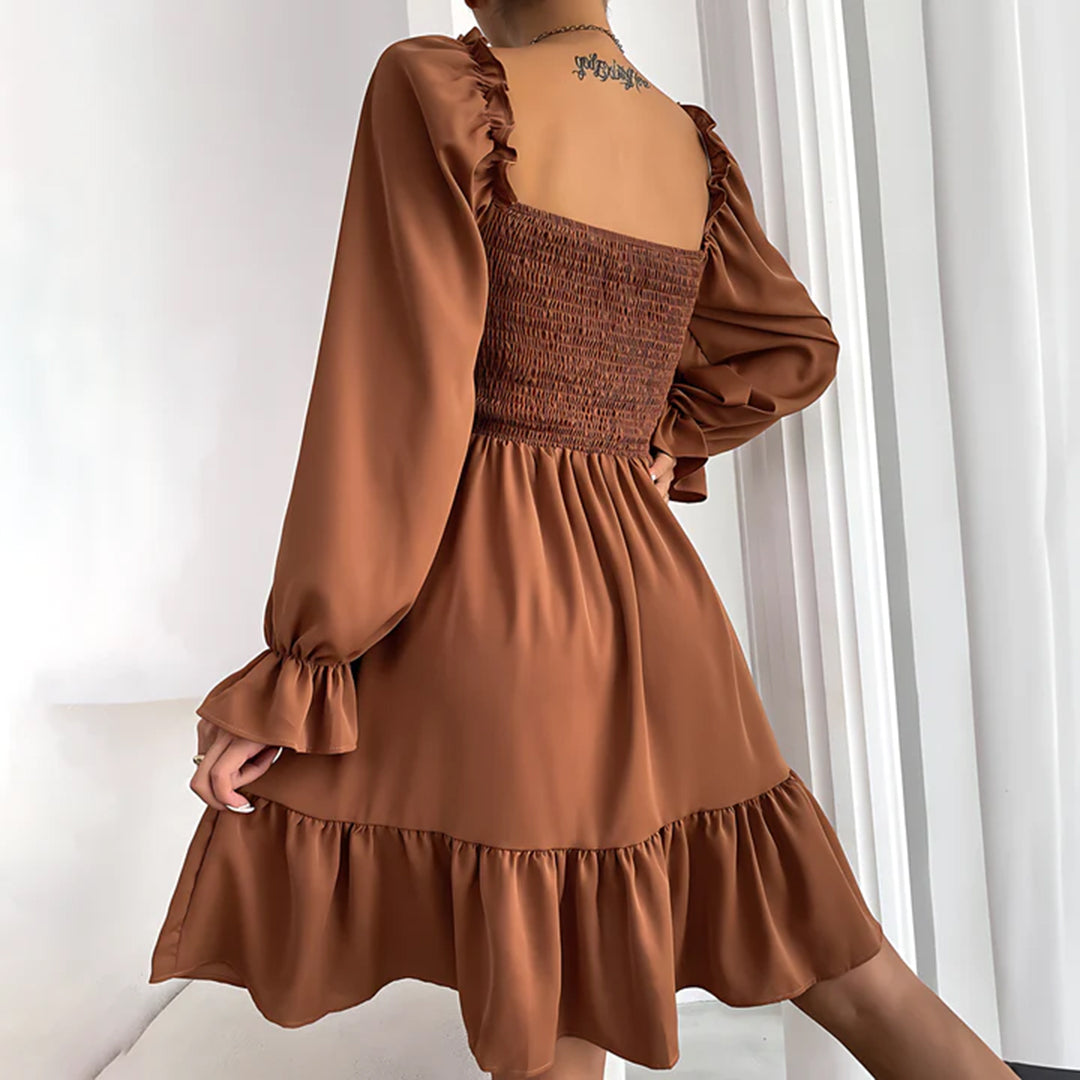 ARIA - Elegante vestido con bonitos volantes