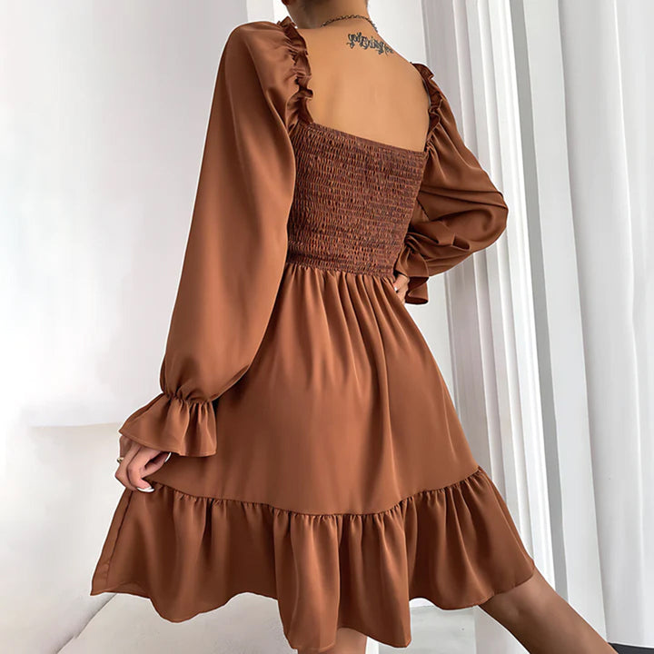 ARIA - Elegante vestido con bonitos volantes