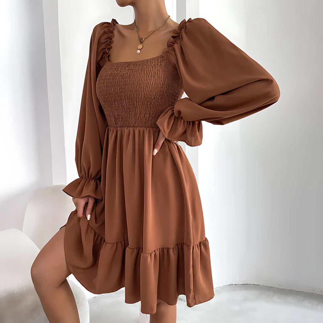 ARIA - Elegante vestido con bonitos volantes