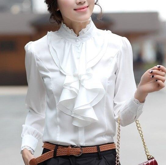 Elegante blusa blanca con cuello de volante y mangas largas - Una prenda imprescindible para cualquier mujer