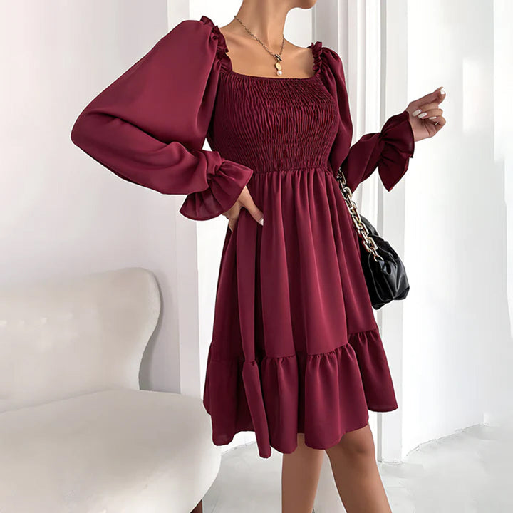ARIA - Elegante vestido con bonitos volantes