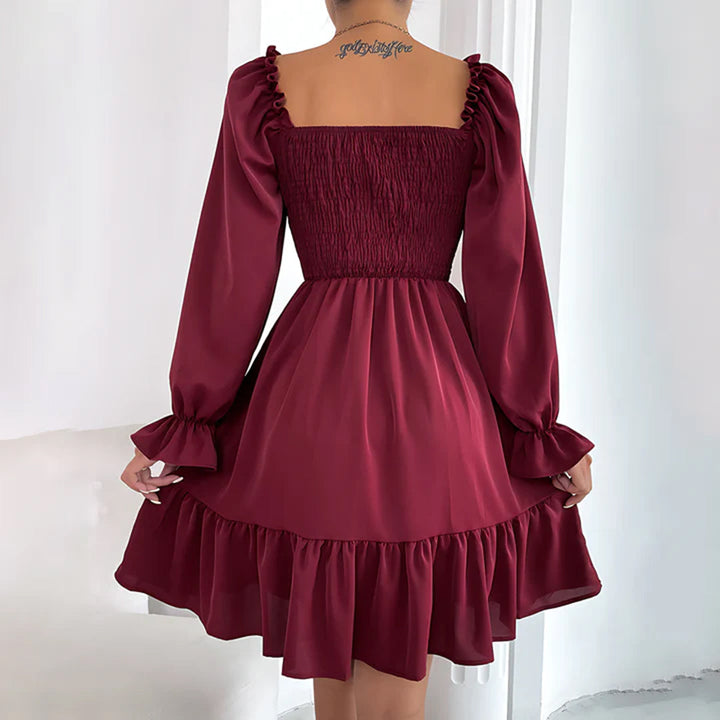 ARIA - Elegante vestido con bonitos volantes