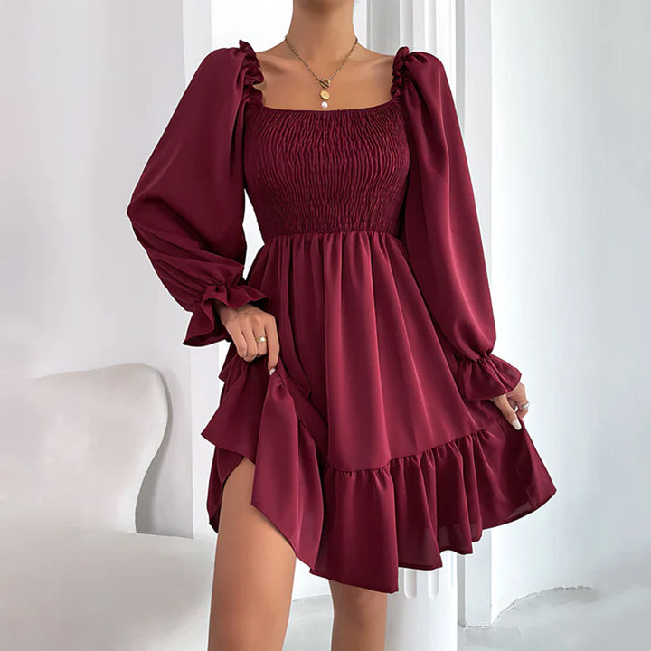 ARIA - Elegante vestido con bonitos volantes