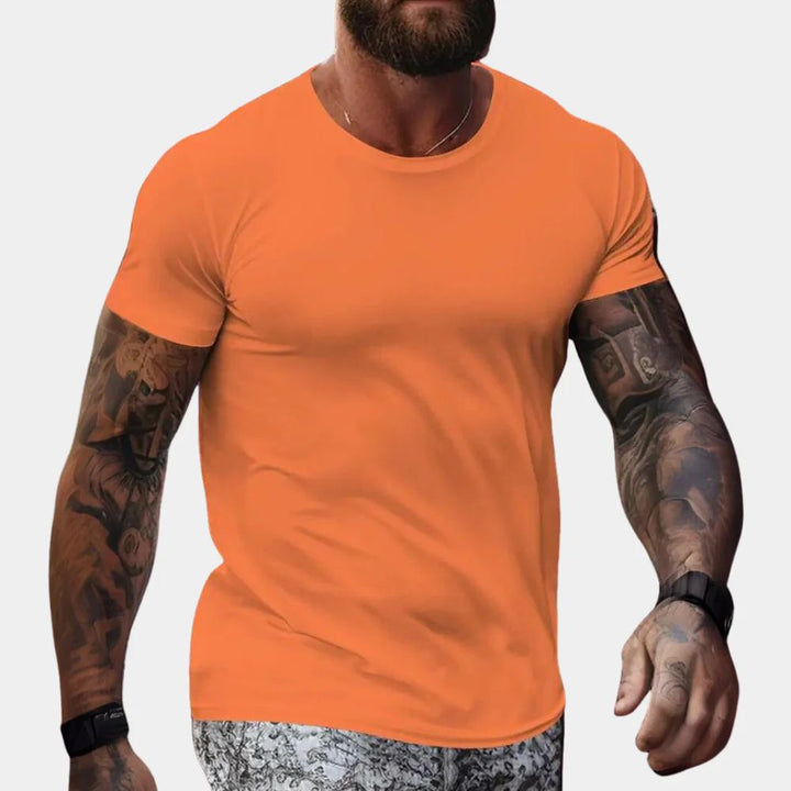 Elegante camiseta naranja de hombre para el verano - ¡Encuentra tu talla perfecta con Vilmar!